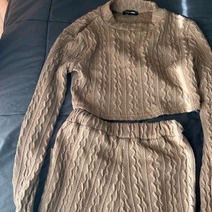 Brown two piece pants set.